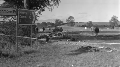 Getty Images A black and white image of the aftermath of the 1975 Miami Showband Massacre