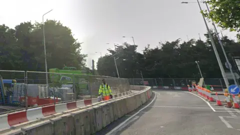 There are traffic cones, barriers and signs next to Gallows Corner, while refurbishment works are ongoing.