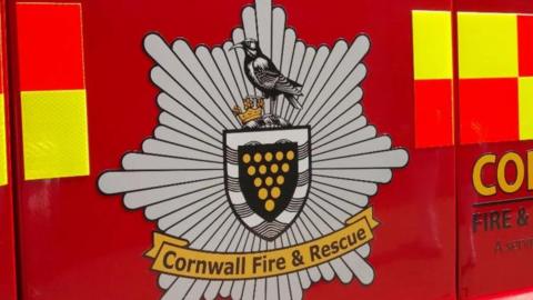 Cornwall Fire Service badge on side of an engine