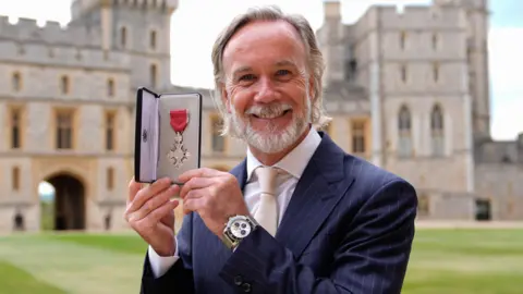 PA Media Chef Marcus Wareing after being made a Member of the Order of the British Empire (MBE) by the Princess Royal at Windsor Castle