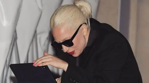 ladygagarazzii  / Instagram Lady Gaga tinkers with her laptop as she plays new music to fans