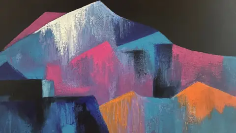 Betsy Smith Mountain range painting. The peaks are painted in an assortment of colours including white, blue, pink and orange. The sky is black