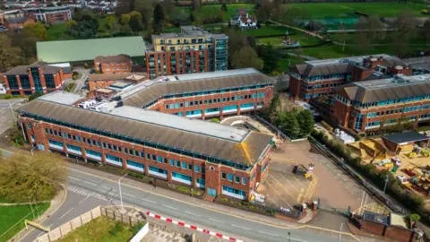 A bird's eye view of St Martin's Place in Slough, an office complex of four buildings.