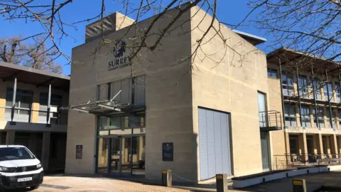 BBC The exterior of the Surrey County Council offices at Woodhatch Place.