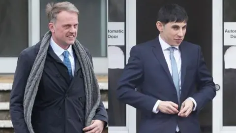 Two men - one blonde, one with black hair - pictured wearing navy suits, white shirts and blue ties. 