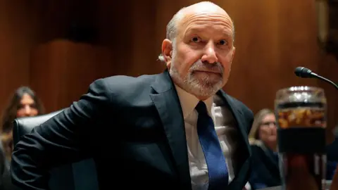 US Secretary of Commerce Howard Lutnick wears a suit while arriving to testify during a Senate Appropriations Subcommittee on Commerce, Justice, Science, and Related Agencies hearing on February 10, 2026.