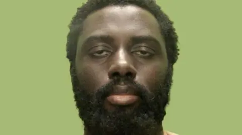 Custody shot of Valdo Calocane