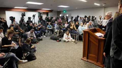 Getty Images The media and members of the Menendez family packed into a room as Los Angeles County District Attorney George Gascón backed a resentencing request in the case