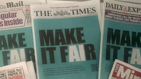 Pictures of several national newspapers carrying a wrap-around ad for the Make It Fair Campaign