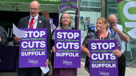 Alice Whaley/BBC Unison members outside Suffolk County Council headquarters