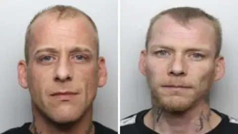 Two police custody photos side by side. The man on the left has short fair hair, blue eyes and a tattoo on his neck. The man on the right has short fair hair, blue eyes, some facial hair and tattoos on his neck.