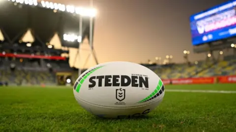 An NRl ball on a field