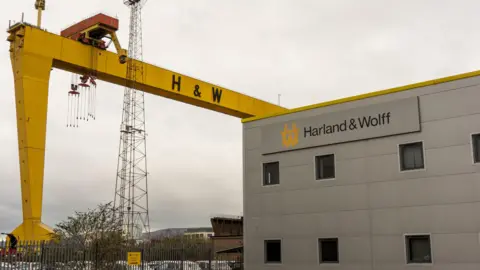 Bloomberg via Getty One of the iconic Harland & Wolff Samson and Goliath yellow gantry cranes near the entrance to the Harland & Wolff Group Holdings Plc shipyard in Belfast.