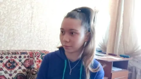 A screenshot of a video released by local activists showing Masha, then 12