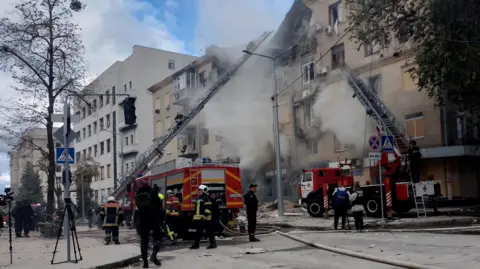 Michael Betoin Firefighters at scene of fire