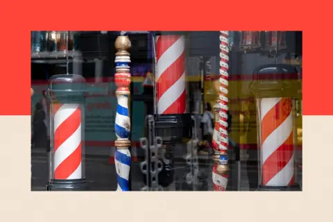 Getty Images A selection of red-and-white and blue-and-white striped barber shop poles