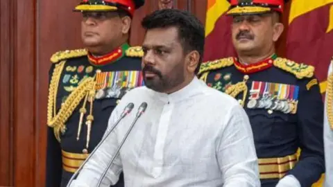 Getty Images Sri Lanka's new president Anura Kumara Dissanayake takes oath as president of Sri Lanka in Colombo, Sri Lanka on September 23, 2024. 