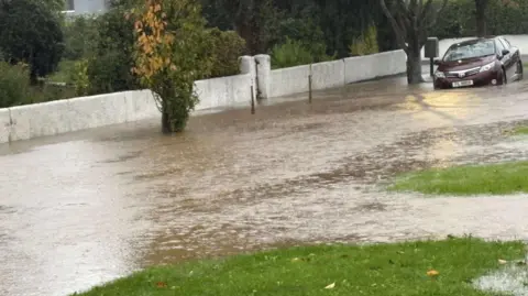 Nicky Thomosn Flooding Slievecorragh Avenue, Newcastle, County Down.