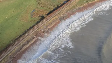 Damaged sea wall near Brora