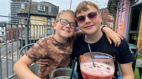 Shelley Thomas (right) with his brother William