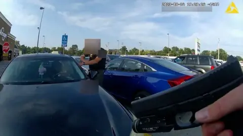 The police bodycam shows the officers gun drawn