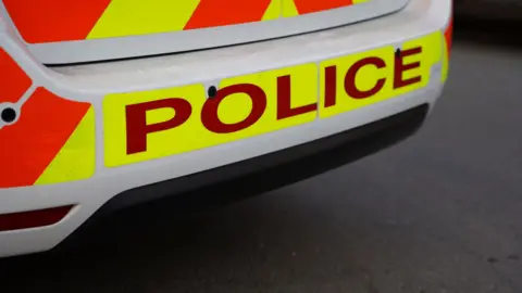 The back of a police car.