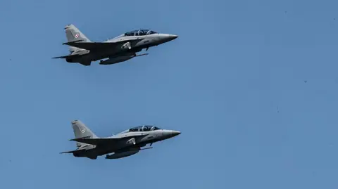 SOPA Images via Getty Images F-16 aircraft during the Polish Army Day Parade on Wislostrada in Warsaw