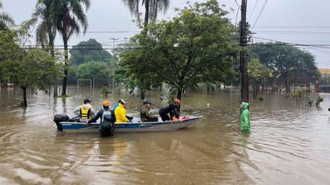 Rescue teams are seen with boats following heavy rains as the death toll from rains has risen to 144 in Porto Alegre, Brazil on May 12, 2024.