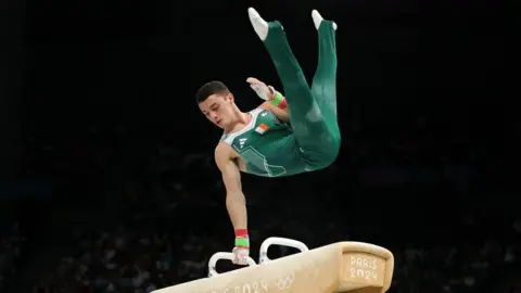 Getty Images Rhys McClenaghan on the pommel horse