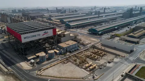 Aluminium Bahrain operates one of the largest smelters in the world. Image shows a number of industrial buildings 