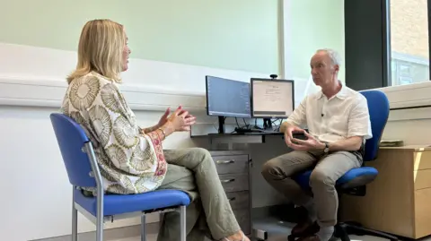 Helen having her annual check up at the UK LAM disease centre in Nottingham. She is sat in a consultation room at the recently expanded centre