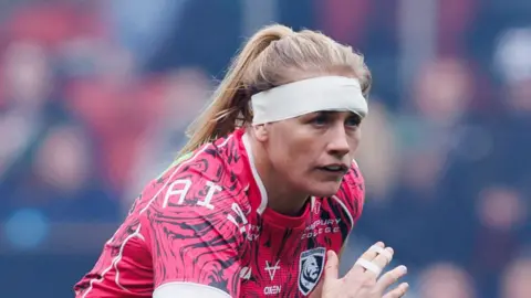 Alex Matthews on the pitch during a Gloucester-Hartpury match this season