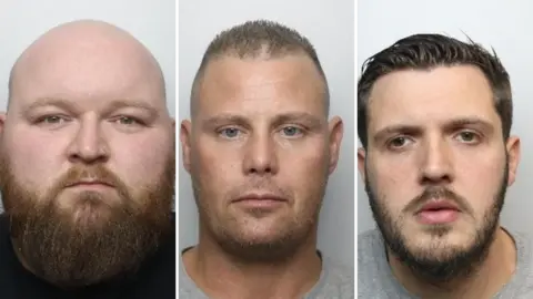 Three men pictured in police mugshots. On the left is a man aged around 30 with a bald head and long brown beard. In the middle is a man in his forties with stubble and short hair. On the right is a man in his thirties with slicked back dark hair and a short beard. 
