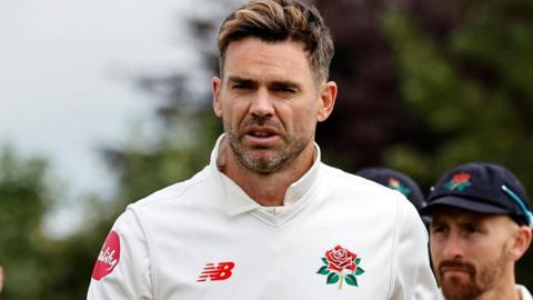 James Anderson walking off the field for Lancashire