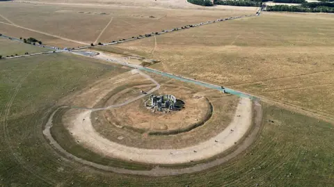 Justin Tallis/Getty Images An aerial image shows the scorched grass surrounding the area at Stonehenge near Amesbury, Wiltshire.