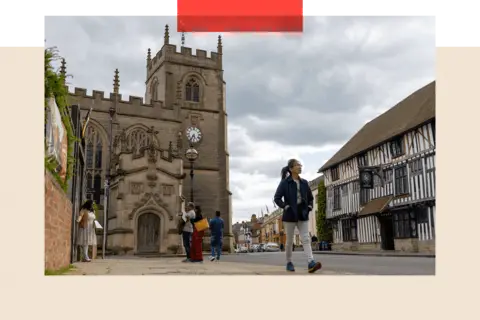 Getty Images Visitors walk along High Street in Stratford-upon-Avon