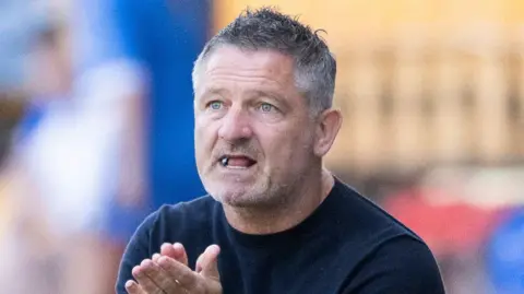 Dundee manager Tony Docherty watches on, in what turned out to be his last match as Dundee manager during a William Hill Premiership match between St Johnstone and Dundee at McDiarmid Park