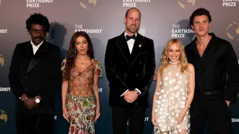 William announces Earthshot Prize 2025 winners in Rio PA Media Seu Gorge, Anitta, the Prince of Wales, Kylie Minogue and Shawn Mendes pose for a photo in smart evening attire.