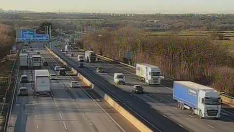 Motorway traffic camera footage of a stretch of the M6 motorway between junction three and junction 4