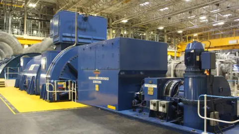 George King/BBC A large blue generator at Sizewell B