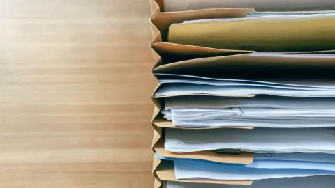Getty Images A stock image of paper files.