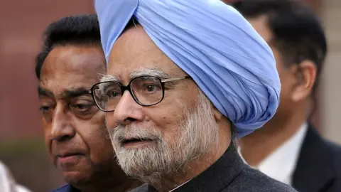 File photo of Manmohan Singh at a press conference