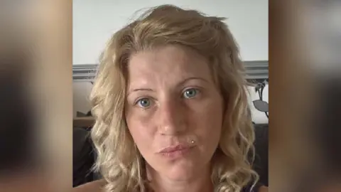 Family photo A selfie of Charlene Dowsell, who has light blonde curly hair and blue eyes.