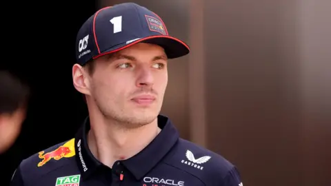 Max Verstappen looking pensive before the 2025 Spanish Grand Prix