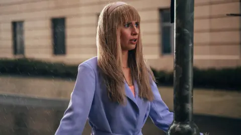 BBC Studios/Bad Wolf/James Pardon Lindy Pepper-Bean (Callie Cooke) appears at Swansea University Bay Campus while filming.