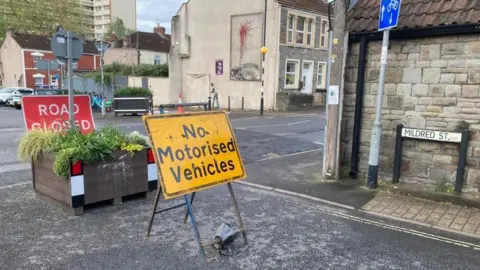 The Barton Bugle A planter located at the junction of Mildred Street which blocks the access to the main road.