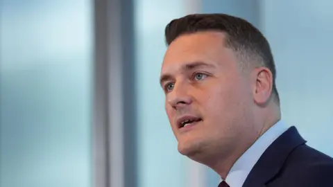 Wes Streeting speaking about progressive capitalism at No1 Tower Place West, in central London. 