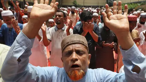 Getty Images Thousands of Bangladeshis held prayers for rains in cities and rural towns on April 24 as an extreme heat wave hit the country