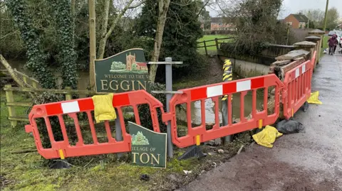 Egginton Brook visible from the junction of Main Street and Ash Grove Lane in Egginton, Derbyshire