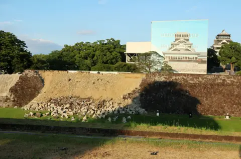 EPA A stone wall at Kumamoto Castle collapsed following the earthquake in Kumamoto City, southwestern Japan, 28 July 2026. 
